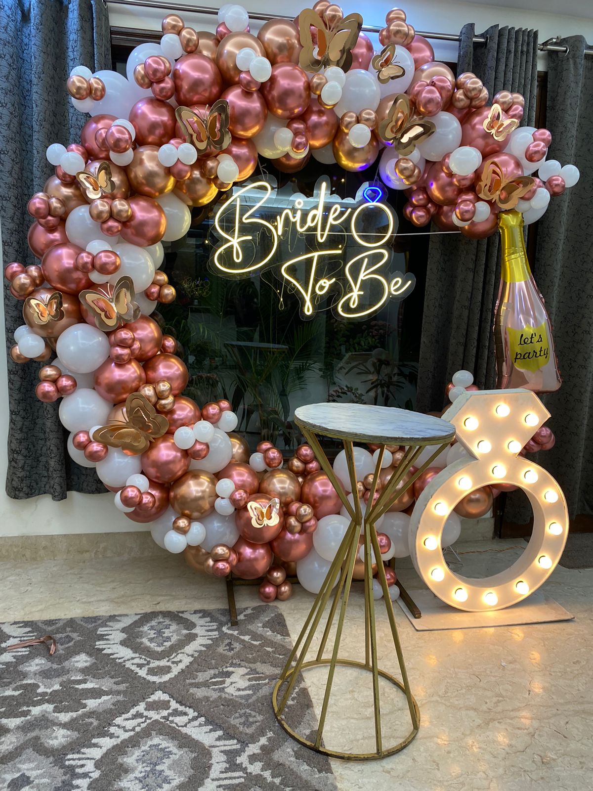 bride to be ring arch with chrome balloons decor