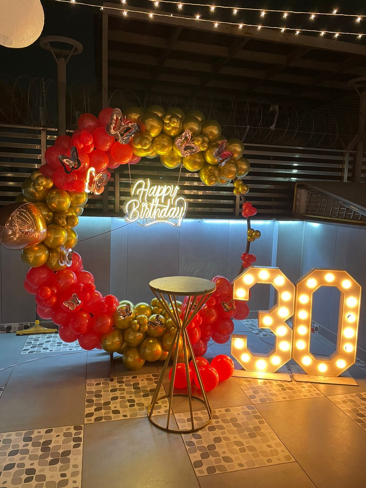 ring arch with chrome balloons decor